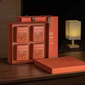 Four cans of Osmanthus Qihong Maofeng tea gift box, 300g each, including shipping and taxes.